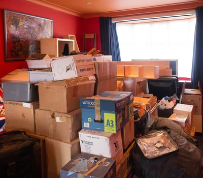 a room with boxes of boxes and boxes of boxes, estate sales, junk