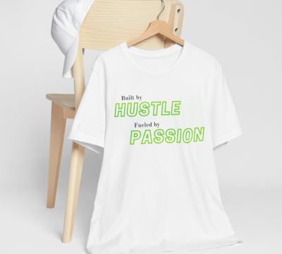 a white t - shirt with a green and white shirt with a wooden chair and