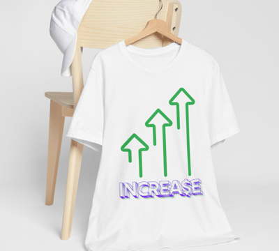 A t-shirt on a hanger, hanging on a chair that says increase with 3 arrows pointing up.