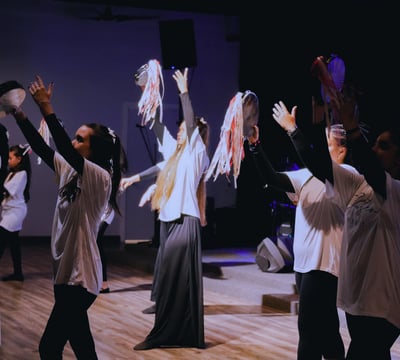 girls of all ages dancing in church