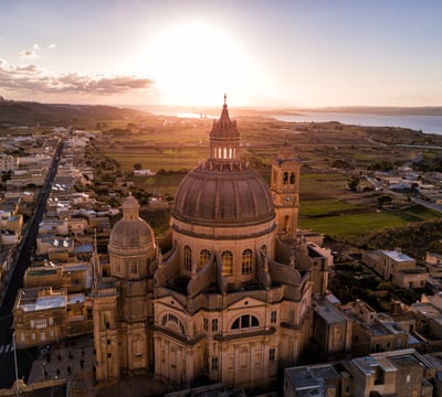 Sunrise over St. John Baptist Church. Gozo, Malta.