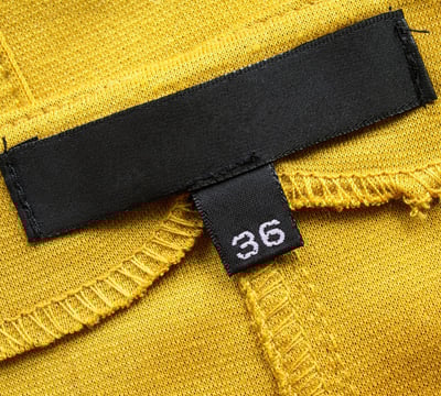 Rongzhiyue: Size label on yellow fabric