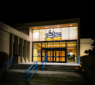 Front entrance of the Ada County Sheriff's Office in Boise Idaho at night.