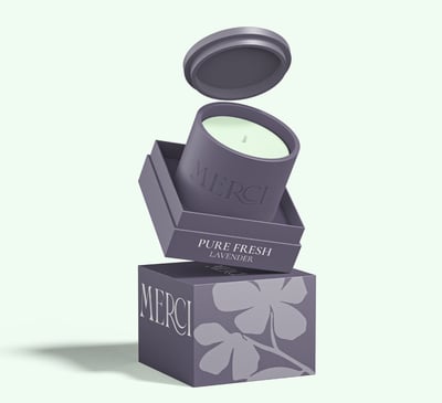 a box with a candle in it, fragance pure fresh lavender