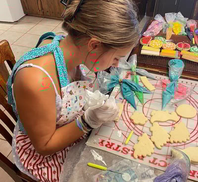 A Real in the moment photo of what it looks like to decorate these cookies
