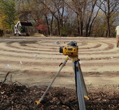 a man standing in a circular maze maze maze