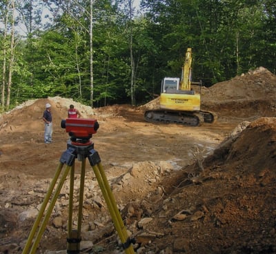 a man standing in front of a construction site