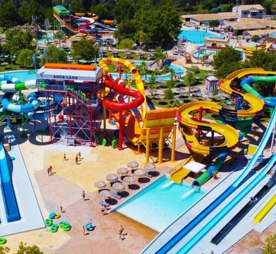 a water park with a large water slider and a large water park