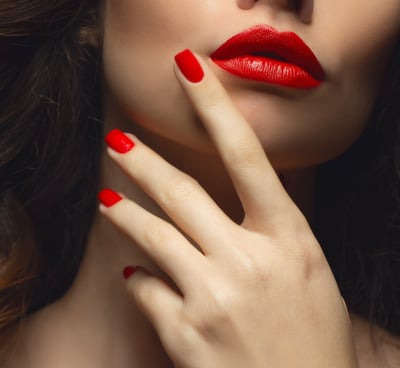 a woman with red lipstick and red lipstick
