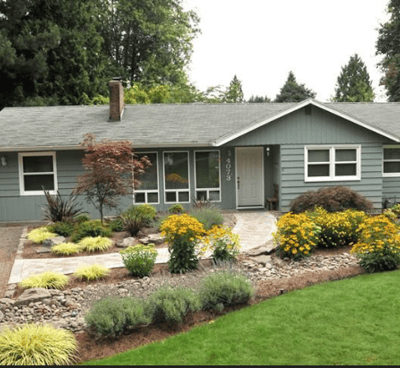 a house with a driveway and driveway with a driveway