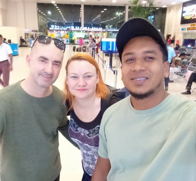 Nobel Travels Lanka airport shuttle guest smiling with driver