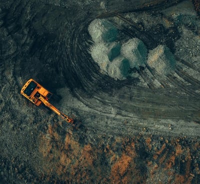 Excavator from above - OreLogic Consulting
