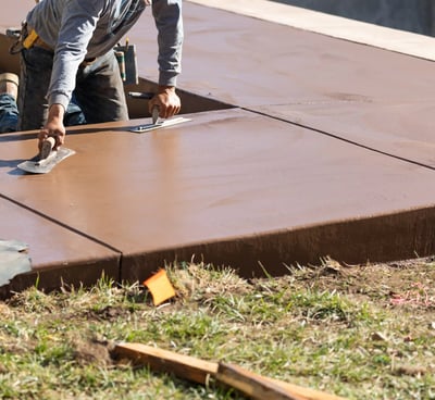 a man is using a sanded in concrete