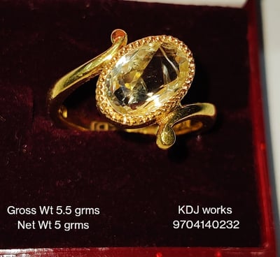 a ring with a yellow gold ring with a yellow topazr