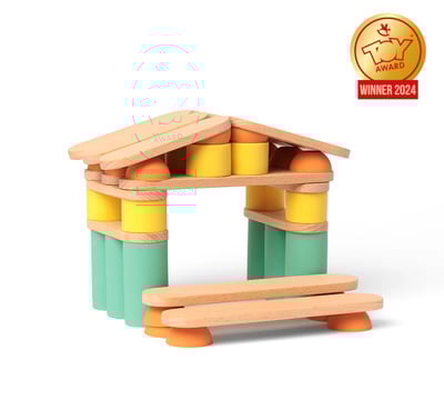 The house is built using colored silicone and wooden parts of the educational game