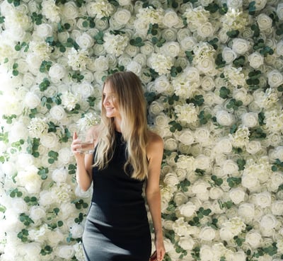 Elegant close-up of white rose flower wall, perfect for weddings, showers, birthdays, and other celebrations