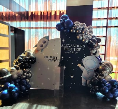 First trip Space themed balloon backdrop rental
