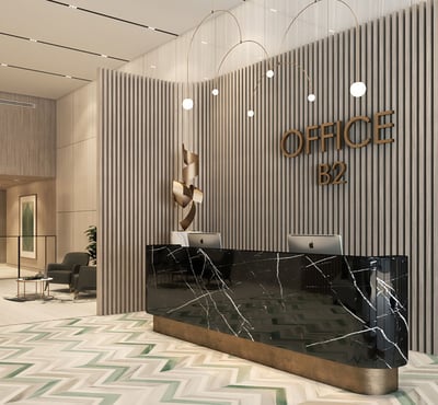 Elegant reception area in a premium office building at One Ninety, featuring warm textures