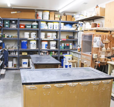 Image of our Moss Street studio glaze room which also houses many of our dry materials.