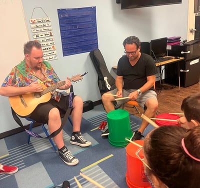john teaching with bucket drum rhythm