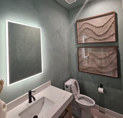 Modern bathroom with a textured limewash finish, creating a sleek and elegant in an Arizona home