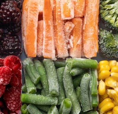 a variety of fruits and vegetables in a tray