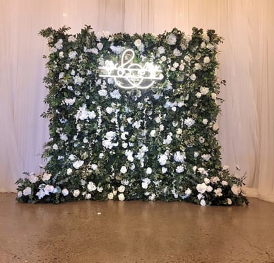 Wedding ceremony with the rose garden flower wall