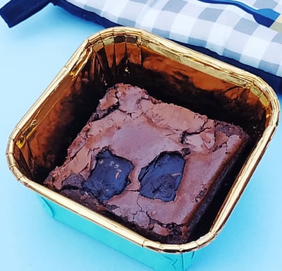single brownie in fancy container