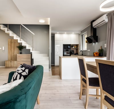a living room with a couch and a table