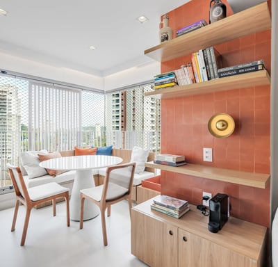 a living room with a table and chairs