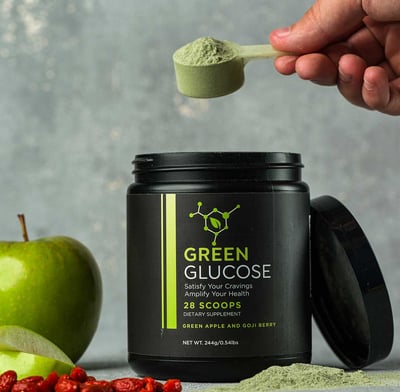 a person scooping out a powdered green tea powdered powdered in a
