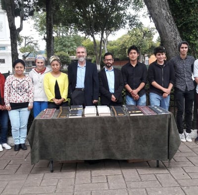 a group of muslims delivering information about Islam