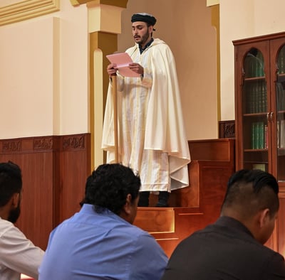 The Imam of Imam Malik Mosque delivering a Jutba