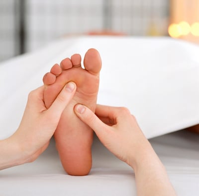 foot massaging using reflexology