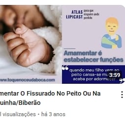 a baby holding a baby's hand while holding a baby's hand