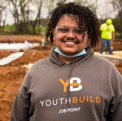 Headshot of Christopher Nichols sporting a Job Point sweatshirt