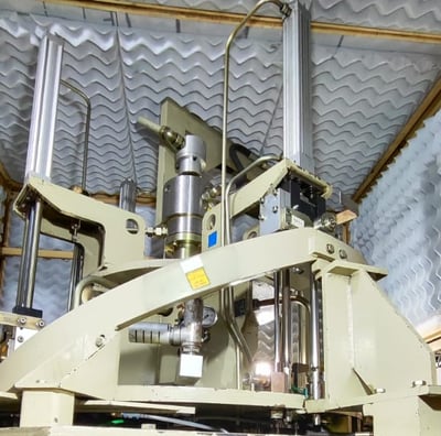 a machine that is making a paper bag