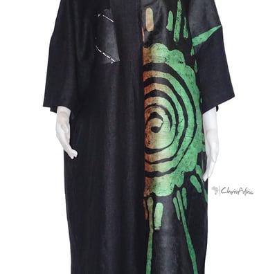 a black and white dress with a green and red tie dye dye