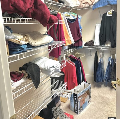 a closet with a closet space for clothes and other items