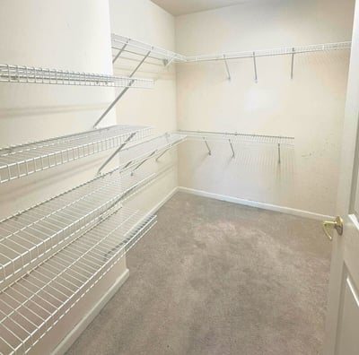 a closet with a closet space for clothes and other items