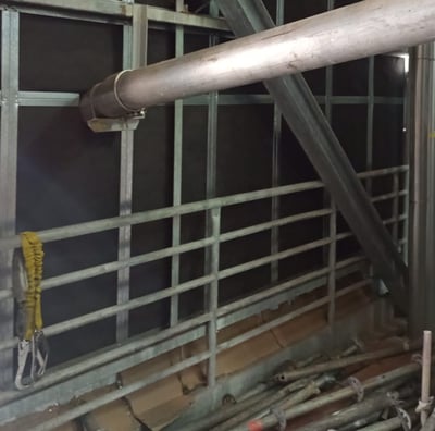 a pipe pipe in a building with pipes and pipes