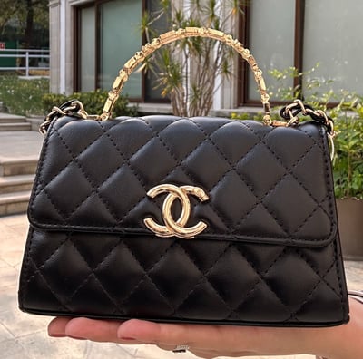 coach bolso clasico mini negro con agarradera negra