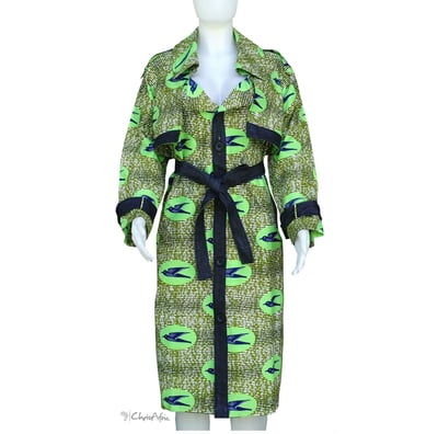 a mannequins woman's green dress with a denim belt