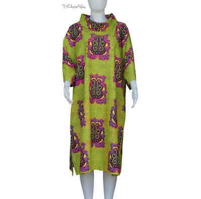 a mannequins' dress with a green and pink dress