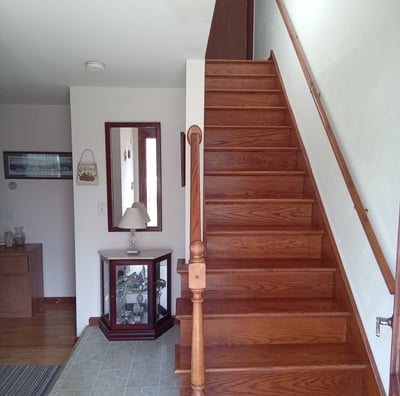 beautiful wooden foyer stairs