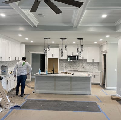 Interior kitchen remodeling project by Garnet Painting — luxury cabinetry, lighting, and ceiling work in Georgia