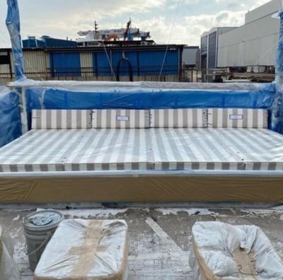 yacht decoration luxury yacht seating area with outdoor and indoor seating cushions.