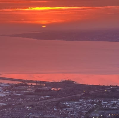 Sunrise over Belfast lough taken from the top of the cave hill Belfast Northern Ireland