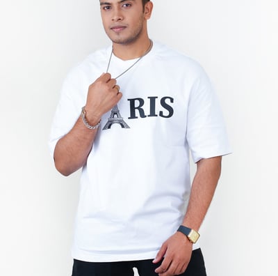 a man in a white shirt and black pants