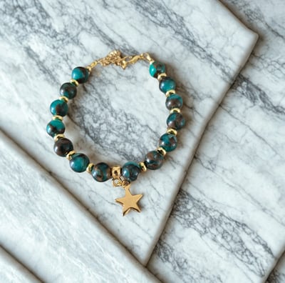 a bracelet bracelet with a starfish charm